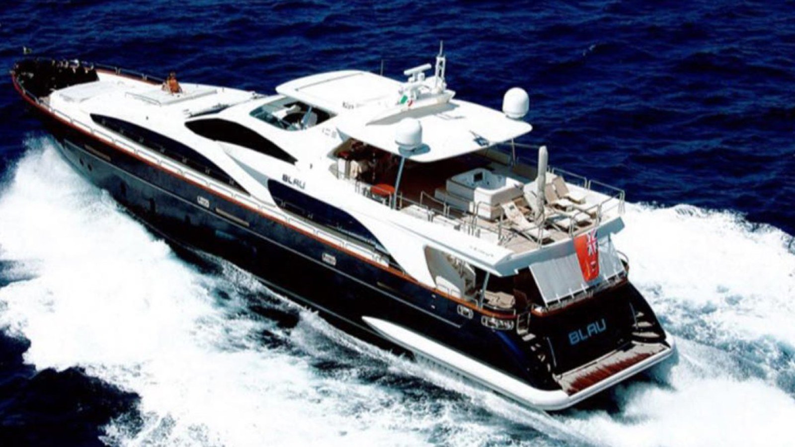 The Azimut 105 superyacht cutting a white wake off Marina Vallarta, one of the owner-listed charter yachts in Puerto Vallarta